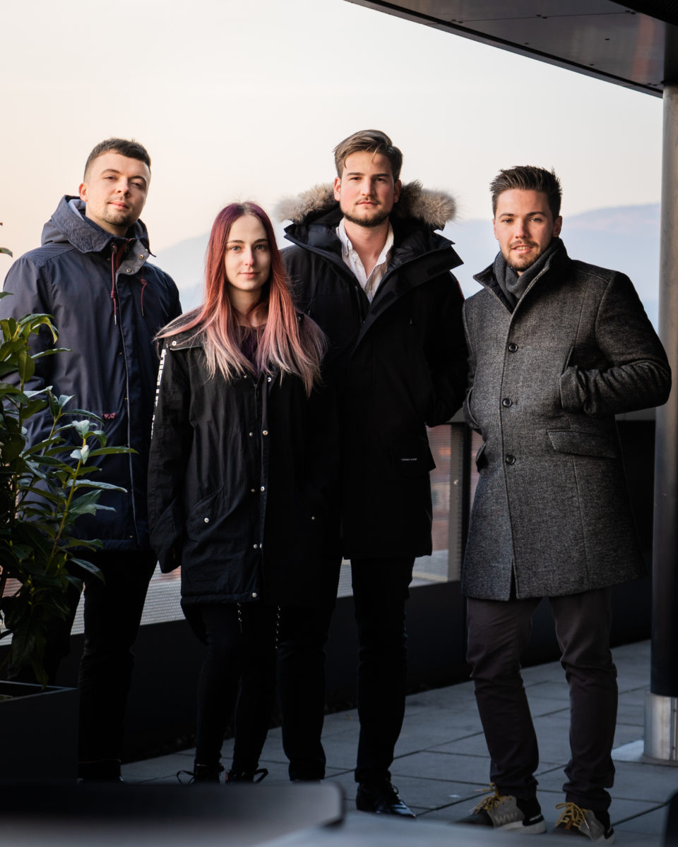 founders, 3 young men and a young woman, in coats