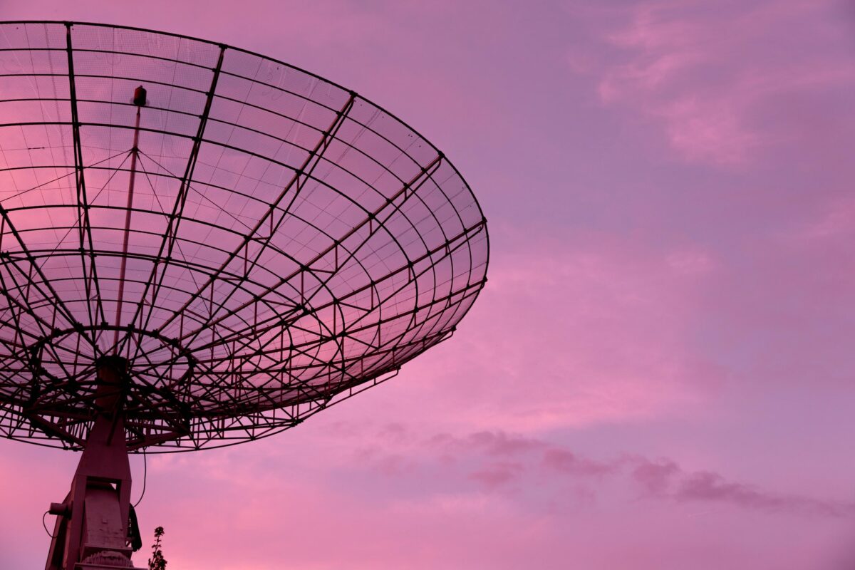 black satellite under pink sky